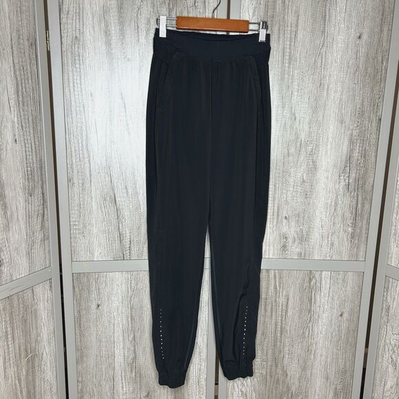 Lululemon Joggers Size 2 Black Color Reflective Pockets Athletic Pants Pull On - Picture 1 of 7